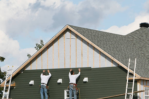 Professional Siding Repair technician working in Burton, OH